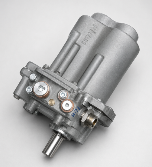 Industrial pneumatic actuator component in cast metal housing